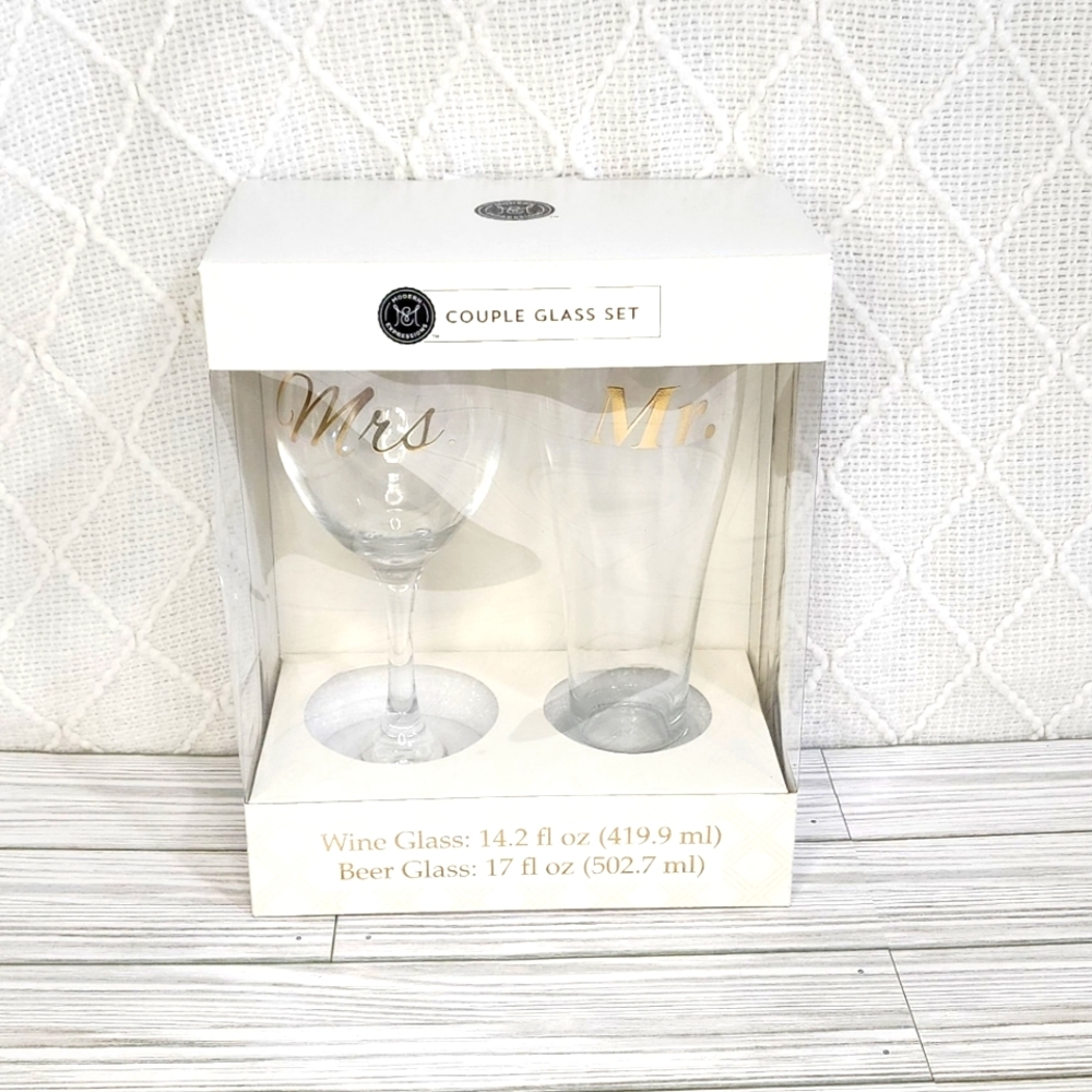 Mr & Mrs toasting glasses